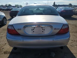 2002 Jaguar S-Type with VIN SAJDA01P52GM27504, listed as a Copart auction lot 57850944 with 119,707 mi miles and Clean Title. Bid and sale history available at DreamBid. Image 6.