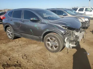 2019 Honda CR-V EX-L with VIN JHLRW2H84KX011642, listed as a Copart auction lot 79219854 with 70,968 mi miles and Salvage Title. Bid and sale history available at carsss.com. Image 4.