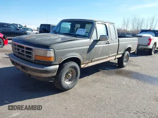 1996 Ford F-150 with VIN 1FTEX14N0TKA41914, listed as a IAAI auction lot 41724340 with 158,652 mi miles. Bid and sale history available at carsss.com. Image 2.