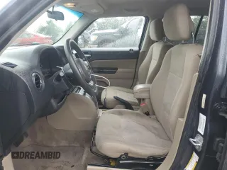 2014 Jeep Patriot Sport with VIN 1C4NJPBA0ED601488, listed as a Copart auction lot 63791785 with 204,926 mi miles and Salvage title. Bid and sale history available at DreamBid. Image 7.