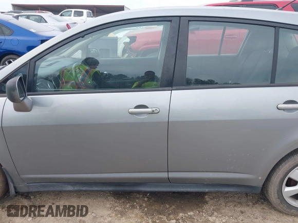 2009 Nissan Versa S with VIN 3N1BC13E59L407294, listed as a IAAI auction lot 41692951 with 250,029 mi miles and . Bid and sale history available at DreamBid. Image 14.