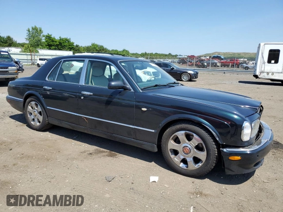 2001 Bentley Arnage with VIN SCBLC31E31CX05992, listed as a Copart auction lot 60462974 with 253,028 mi miles and Salvage Title. Bid and sale history available at DreamBid. Image 4.