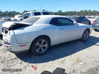 2016 Dodge Challenger SXT with VIN 2C3CDZAG1GH101561, listed as a IAAI auction lot 41684800 with 169,667 mi miles. Bid and sale history available at carsss.com. Image 4.