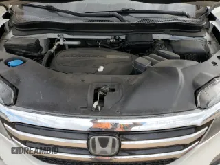 2017 Honda Pilot Touring z VIN 5FNYF6H92HB067140, wystawiony jako Copart lot #72200584 z przebiegiem 127 856 mil mil oraz Szkoda całkowita • Salvage title. Historia ofert i sprzedaży dostępna na DreamBid. Obrazek 14.