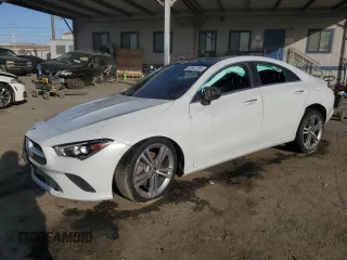 2022 Mercedes-Benz CLA with VIN W1K5J4GB7NN318960, listed as a Copart auction lot 87661255 with 35,990 mi miles and Salvage Title. Bid and sale history available at carsss.com. Image 1.