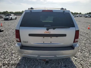 2009 Jeep Grand Cherokee Laredo with VIN 1J8GR48K09C551423, listed as a Copart auction lot 54094465 with 163,263 mi miles and Clean Title. Bid and sale history available at carsss.com. Image 6.