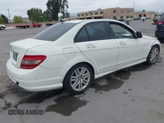 2009 Mercedes-Benz C-Class 3.0L Sport with VIN WDDGF54X19R082613, listed as a IAAI auction lot 42078992 with 140,707 mi miles. Bid and sale history available at carsss.com. Image 4.