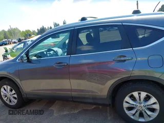 2014 Honda CR-V EX-L with VIN 5J6RM4H79EL077096, listed as a IAAI auction lot 42153513 with 104,972 mi miles and . Bid and sale history available at DreamBid. Image 14.