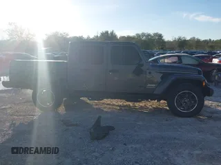 2023 Jeep Gladiator Overland z VIN 1C6HJTFG1PL546604, wystawiony jako IAAI lot #41599632 z przebiegiem 23 108 mil mil oraz . Historia ofert i sprzedaży dostępna na DreamBid. Obrazek 14.