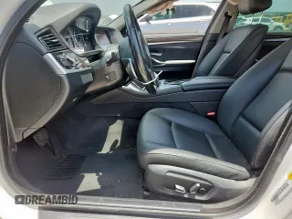 2016 BMW 5 Series 528i with VIN WBA5A5C59GD528109, listed as a Copart auction lot 61691405 with 107,837 mi miles and Salvage title. Bid and sale history available at DreamBid. Image 7.