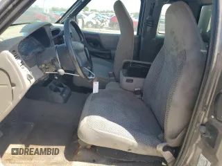 1999 Ford Ranger XL with VIN 1FTYR14VXXPA68148, listed as a Copart auction lot 51490594 with 166,889 mi miles and Salvage Title. Bid and sale history available at carsss.com. Image 7.