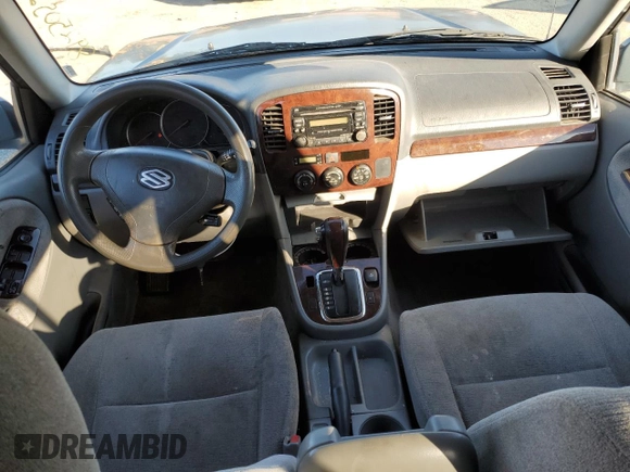 2005 Suzuki XL7 LX z VIN JS3TY92V754104828, wystawiony jako Copart lot #89250525 z przebiegiem 161 355 mil mil oraz Szkoda całkowita • Salvage title. Historia ofert i sprzedaży dostępna na DreamBid. Obrazek 8.