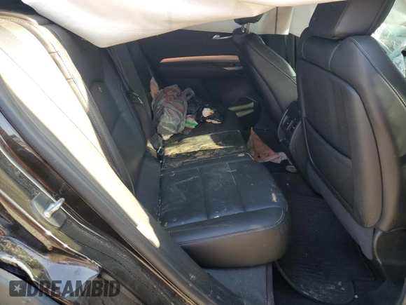 2021 Cadillac XT4 FWD Premium Luxury z VIN 1GYFZCR45MF002654, wystawiony jako Copart lot #52288105 z przebiegiem Nie podano mil oraz Szkody całkowita. Historia ofert i sprzedaży dostępna na DreamBid. Obrazek 11.