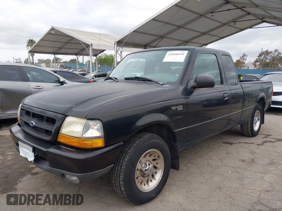 1999 Ford Ranger XL with VIN 1FTYR14X8XTA10015, listed as a IAAI auction lot 42068644 with 52,621 mi miles. Bid and sale history available at carsss.com. Image 2.