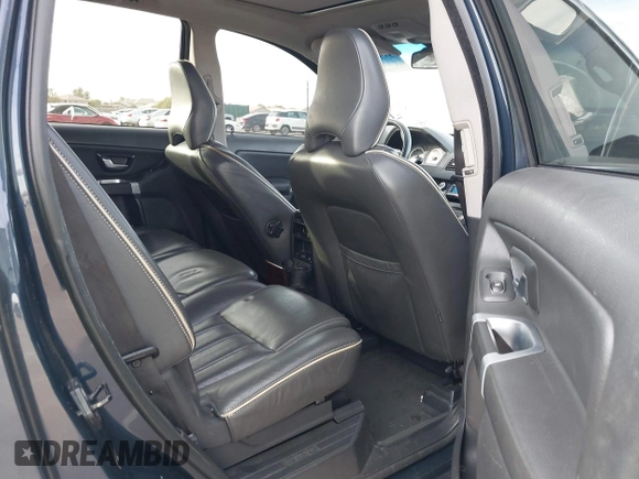 2013 Volvo XC90 Premier Plus z VIN YV4952CY0D1661126, wystawiony jako IAAI lot #41421793 z przebiegiem 136 955 mil mil oraz . Historia ofert i sprzedaży dostępna na DreamBid. Obrazek 8.
