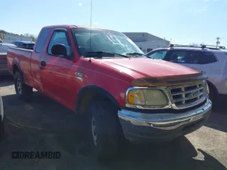 2003 Ford F-150 XL with VIN 1FTPX18LX3NB05456, listed as a IAAI auction lot 41787506 with 228,529 mi miles. Bid and sale history available at carsss.com. Image 1.