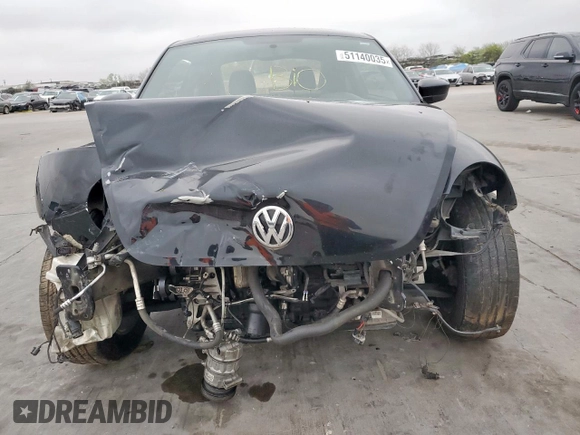 2013 Volkswagen Beetle Entry with VIN 3VWFP7AT8DM630744, listed as a Copart auction lot 51140035 with 118,649 mi miles and Clean Title. Bid and sale history available at DreamBid. Image 5.