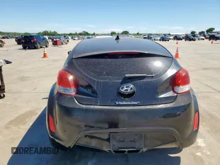 2016 Hyundai Veloster z VIN KMHTC6AD0GU266707, wystawiony jako Copart lot #57617395 z przebiegiem 70 677 mil mil oraz Szkoda całkowita • Salvage title. Historia ofert i sprzedaży dostępna na DreamBid. Obrazek 6.