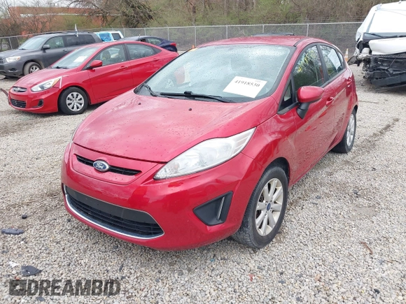 2011 Ford Fiesta SE with VIN 3FADP4EJ9BM216456, listed as a IAAI auction lot 41918530 with 165,989 mi miles. Bid and sale history available at carsss.com. Image 2.