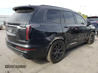 2020 Cadillac XT6 AWD Sport z VIN 1GYKPGRS3LZ109709, wystawiony jako Copart lot #75341924 z przebiegiem 60 420 mil mil oraz Szkoda całkowita • Salvage title. Historia ofert i sprzedaży dostępna na DreamBid. Obrazek 3.