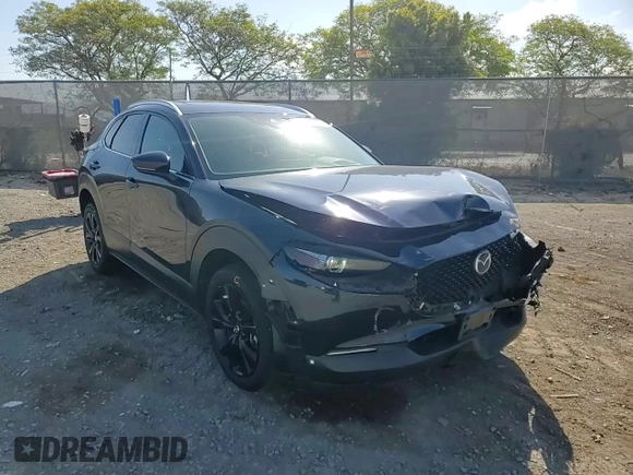 2023 Mazda CX-30 S Premium with VIN 3MVDMBDM7PM543849, listed as a Copart auction lot 54852415 with 20,898 mi miles and Salvage title. Bid and sale history available at DreamBid. Image 14.