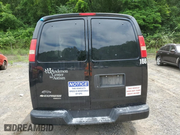 2015 Chevrolet Express Passenger LS with VIN 1GAWGPFG0F1141701, listed as a Copart auction lot 62818685 with 63,219 mi miles and Salvage title. Bid and sale history available at DreamBid. Image 6.