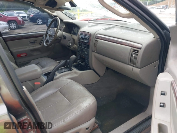 2002 Jeep Grand Cherokee Limited with VIN 1J8GW58N22C173250, listed as a IAAI auction lot 42480524 with 162,341 mi miles and . Bid and sale history available at DreamBid. Image 5.