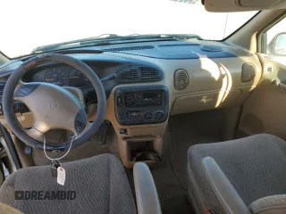 1998 Plymouth Voyager SE z VIN 1P4GP44G4WB522499, wystawiony jako Copart lot #73675104 z przebiegiem 167 141 mil mil oraz Szkody całkowita. Historia ofert i sprzedaży dostępna na DreamBid. Obrazek 8.