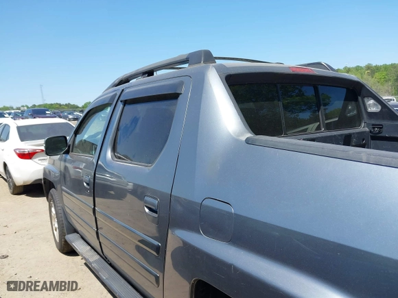 2009 Honda Ridgeline RTS with VIN 5FPYK16409B105186, listed as a IAAI auction lot 42003632 with 153,072 mi miles. Bid and sale history available at carsss.com. Image 13.