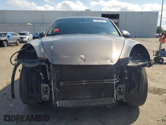 2011 Porsche Cayenne with VIN WP1AA2A28BLA04200, listed as a Copart auction lot 56824575 with 180,123 mi miles and Salvage title. Bid and sale history available at DreamBid. Image 5.
