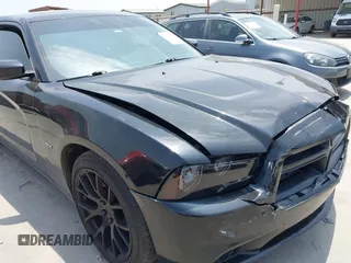 2014 Dodge Charger RT z VIN 2C3CDXCT4EH337763, wystawiony jako IAAI lot #42281217 z przebiegiem 121 653 mil mil oraz . Historia ofert i sprzedaży dostępna na DreamBid. Obrazek 17.