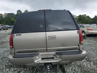 2000 Cadillac Escalade z VIN 1GYEK13R5YR112858, wystawiony jako Copart lot #71651294 z przebiegiem 228 689 mil mil oraz Szkody całkowita. Historia ofert i sprzedaży dostępna na DreamBid. Obrazek 6.