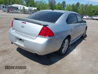 2013 Chevrolet Impala LTZ with VIN 2G1WC5E36D1205567, listed as a IAAI auction lot 42114960 with 169,804 mi miles and . Bid and sale history available at DreamBid. Image 4.