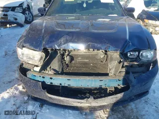 2014 Dodge Charger SE with VIN 2C3CDXBGXEH306800, listed as a IAAI auction lot 41276085 with 140,964 mi miles. Bid and sale history available at carsss.com. Image 6.