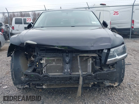 2019 Volkswagen Tiguan S with VIN 3VV0B7AX9KM019775, listed as a IAAI auction lot 41897497 with 61,691 mi miles and . Bid and sale history available at DreamBid. Image 6.