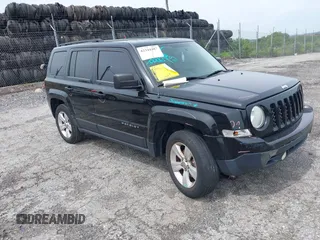 2015 Jeep Patriot Sport z VIN 1C4NJRBB1FD121420, wystawiony jako IAAI lot #42344487 z przebiegiem 124 288 mil mil oraz . Historia ofert i sprzedaży dostępna na DreamBid. Obrazek 1.