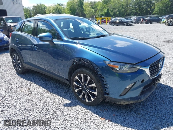 2019 Mazda CX-3 Touring z VIN JM1DKFC72K1459583, wystawiony jako IAAI lot #42380694 z przebiegiem 13 846 mil mil oraz . Historia ofert i sprzedaży dostępna na DreamBid. Obrazek 1.
