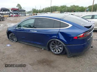 2018 Tesla Model X 75D with VIN 5YJXCAE2XJF111180, listed as a IAAI auction lot 41988079 with 114,593 mi miles and . Bid and sale history available at DreamBid. Image 14.