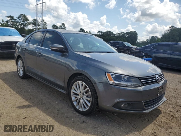 2014 Volkswagen Jetta TDI w/Premium with VIN 3VWLL7AJ4EM374570, listed as a Copart auction lot 63996195 with 186,497 mi miles and Salvage title. Bid and sale history available at DreamBid. Image 4.