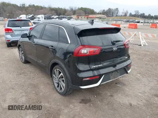 2017 Kia Niro Touring with VIN KNDCE3LC0H5040261, listed as a IAAI auction lot 41751900 with 100,194 mi miles. Bid and sale history available at carsss.com. Image 3.