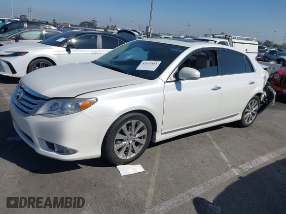 2012 Toyota Avalon with VIN 4T1BK3DB1CU469574, listed as a IAAI auction lot 41633881 with 128,425 mi miles and . Bid and sale history available at DreamBid. Image 2.