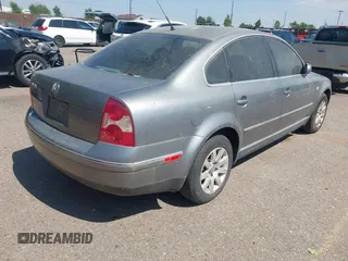 2003 Volkswagen Passat GLS z VIN WVWPD63B93P282332, wystawiony jako IAAI lot #42710298 z przebiegiem 206 409 mil mil oraz . Historia ofert i sprzedaży dostępna na DreamBid. Obrazek 4.