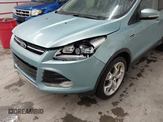 2013 Ford Escape Titanium with VIN 1FMCU9J9XDUC60029, listed as a IAAI auction lot 41936948 with 184,012 mi miles and . Bid and sale history available at DreamBid. Image 6.