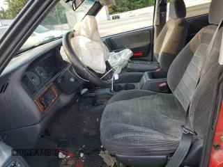 1996 Jeep Grand Cherokee z VIN 1J4EZ58Y5TC142263, wystawiony jako Copart lot #70532894 z przebiegiem Nie podano mil oraz Szkoda całkowita • Salvage title. Historia ofert i sprzedaży dostępna na DreamBid. Obrazek 7.