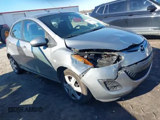 2011 Mazda 2 Sport with VIN JM1DE1HY9B0121499, listed as a IAAI auction lot 41335064 with 128,277 mi miles. Bid and sale history available at carsss.com. Image 1.