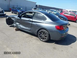 2014 BMW 2 Series M235i with VIN WBA1J7C51EVX33702, listed as a IAAI auction lot 41713337 with 83,076 mi miles. Bid and sale history available at carsss.com. Image 3.