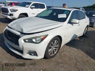 2015 Infiniti Q50 Premium z VIN JN1BV7AP5FM333958, wystawiony jako IAAI lot #42351044 z przebiegiem 158 428 mil mil oraz . Historia ofert i sprzedaży dostępna na DreamBid. Obrazek 2.