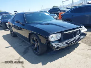 2014 Dodge Challenger R/T with VIN 2C3CDYBT8EH280622, listed as a IAAI auction lot 41973994 with 86,983 mi miles and . Bid and sale history available at DreamBid. Image 1.