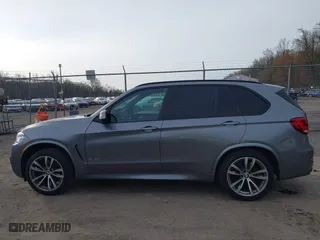 2018 BMW X5 xDrive35i with VIN 5UXKR0C50J0X92561, listed as a IAAI auction lot 41866445 with 56,918 mi miles. Bid and sale history available at carsss.com. Image 14.