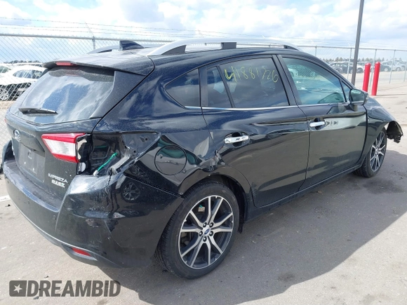 2017 Subaru Impreza Limited with VIN 4S3GTAT64H3737398, listed as a IAAI auction lot 41881726 with 54,879 mi miles. Bid and sale history available at carsss.com. Image 4.